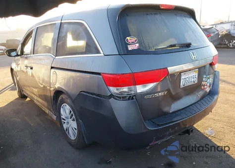 2014 Honda Odyssey Lx z USA, uszkodzony, nr VIN 5FNRL5H26EB047155